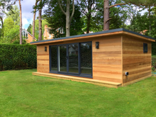 Load image into Gallery viewer, Garden room home office with bifold doors