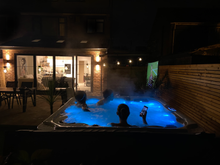 Load image into Gallery viewer, MAJORCA (USED) - This 6 seater family tub has 1 lounger, 1 massage pod and mounted Bluetooth speakers