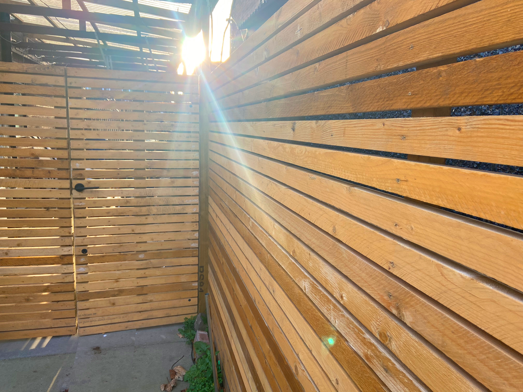 TIMBER PANEL FENCE - Treated timber cedar-style panelled fencing from £55m2